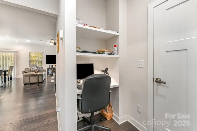 a view of a workspace with furniture and a livingroom view