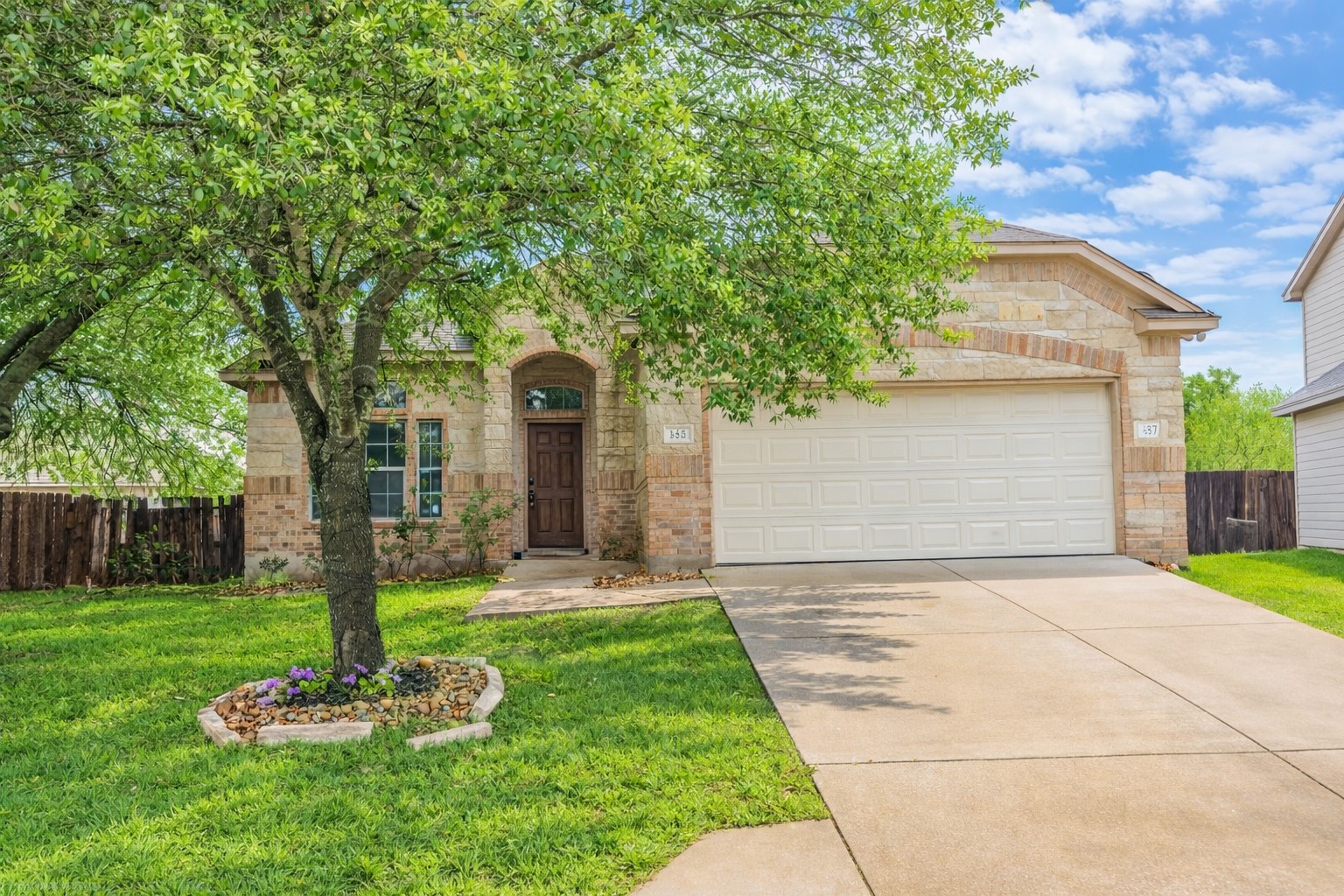 140 Dropper Kyle, TX 78640 - Photo 1 of 30 a front view of a house with a yard