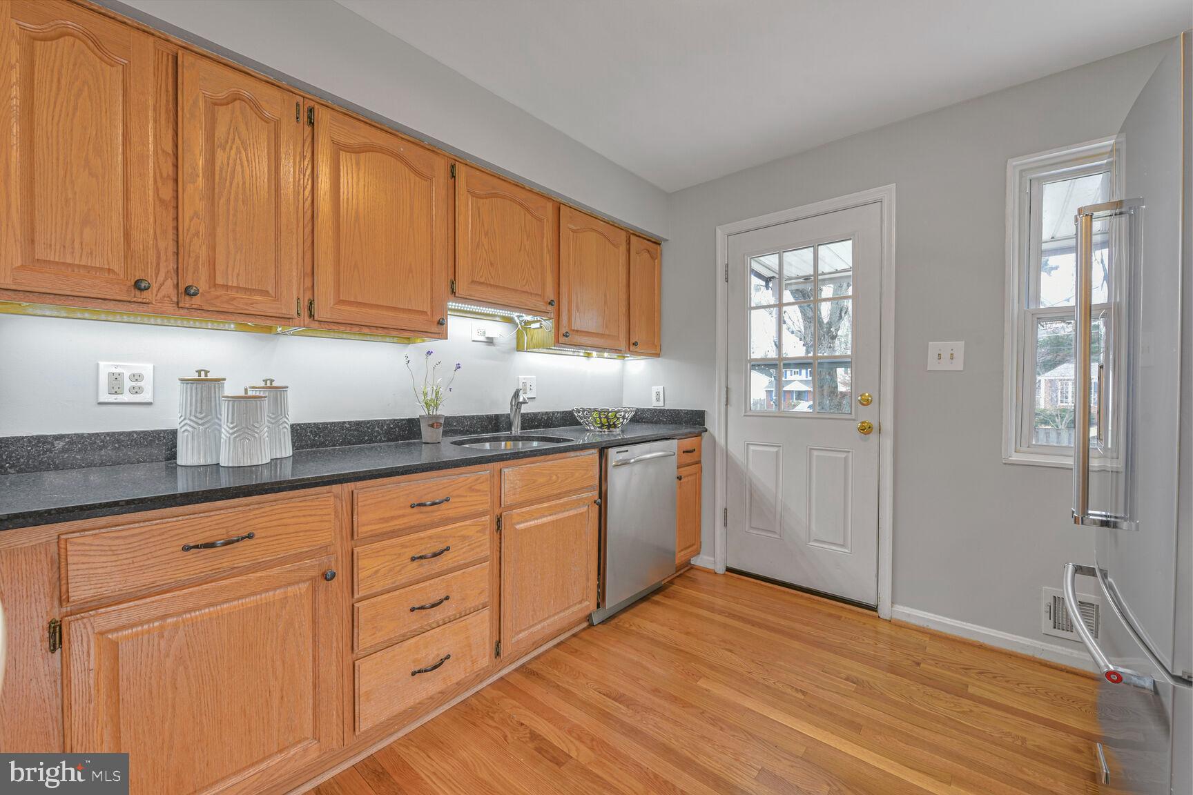 10321 Wood Road Fairfax, VA 22030 - Photo 18 of 55 Kitchen Side Door to Patio