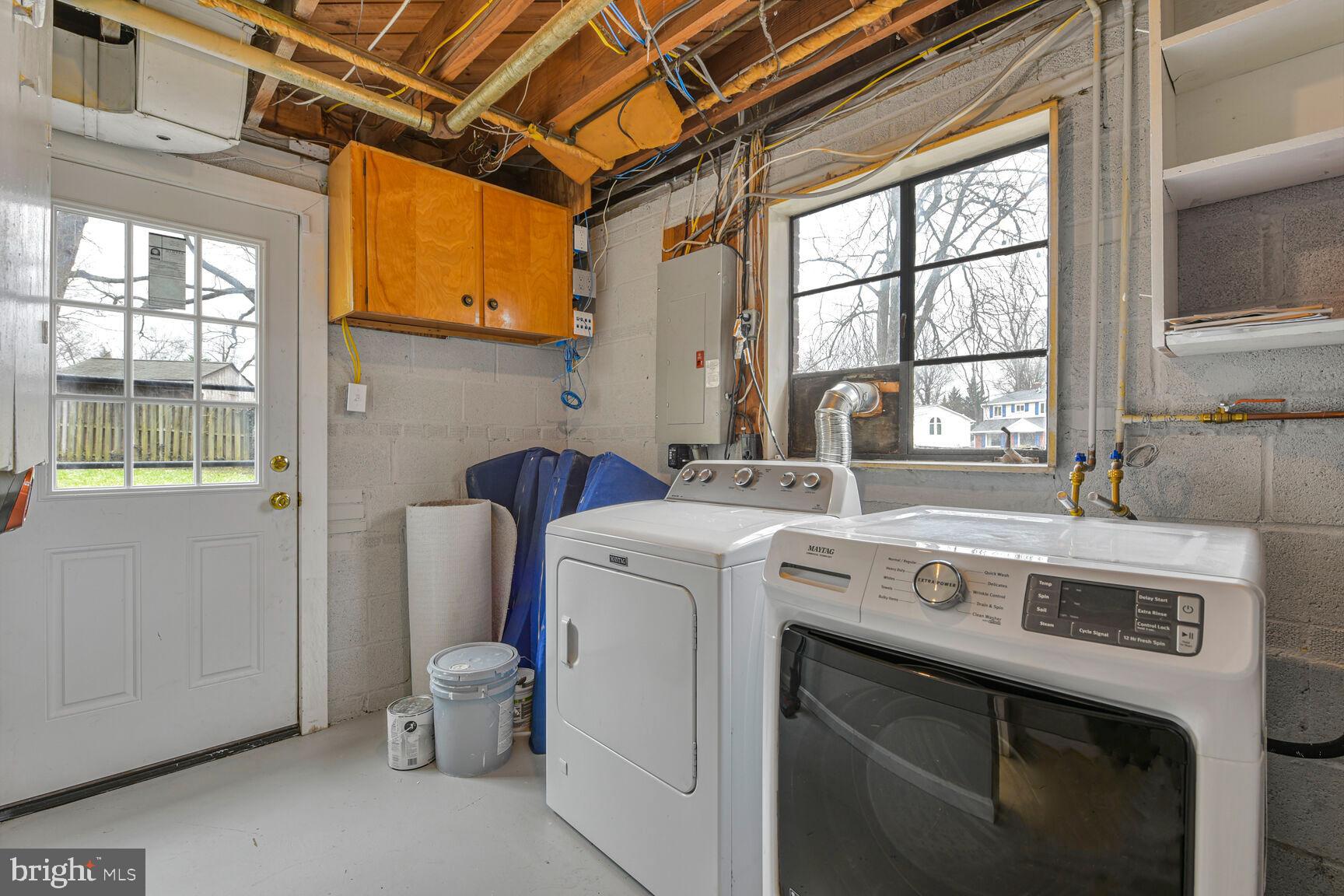 10321 Wood Road Fairfax, VA 22030 - Photo 43 of 55 Lower Level Laundry Room with Access to Backyard