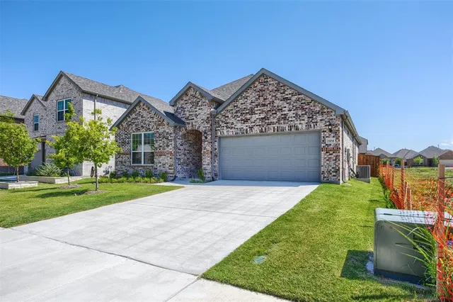 a view of a house with a swimming pool