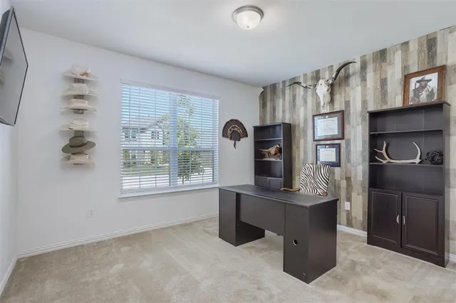 a bathroom with a sink mirror vanity and toilet