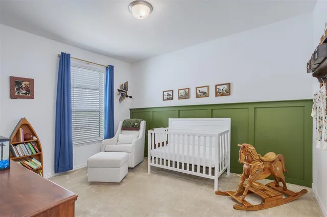a bathroom with a shower and a sink