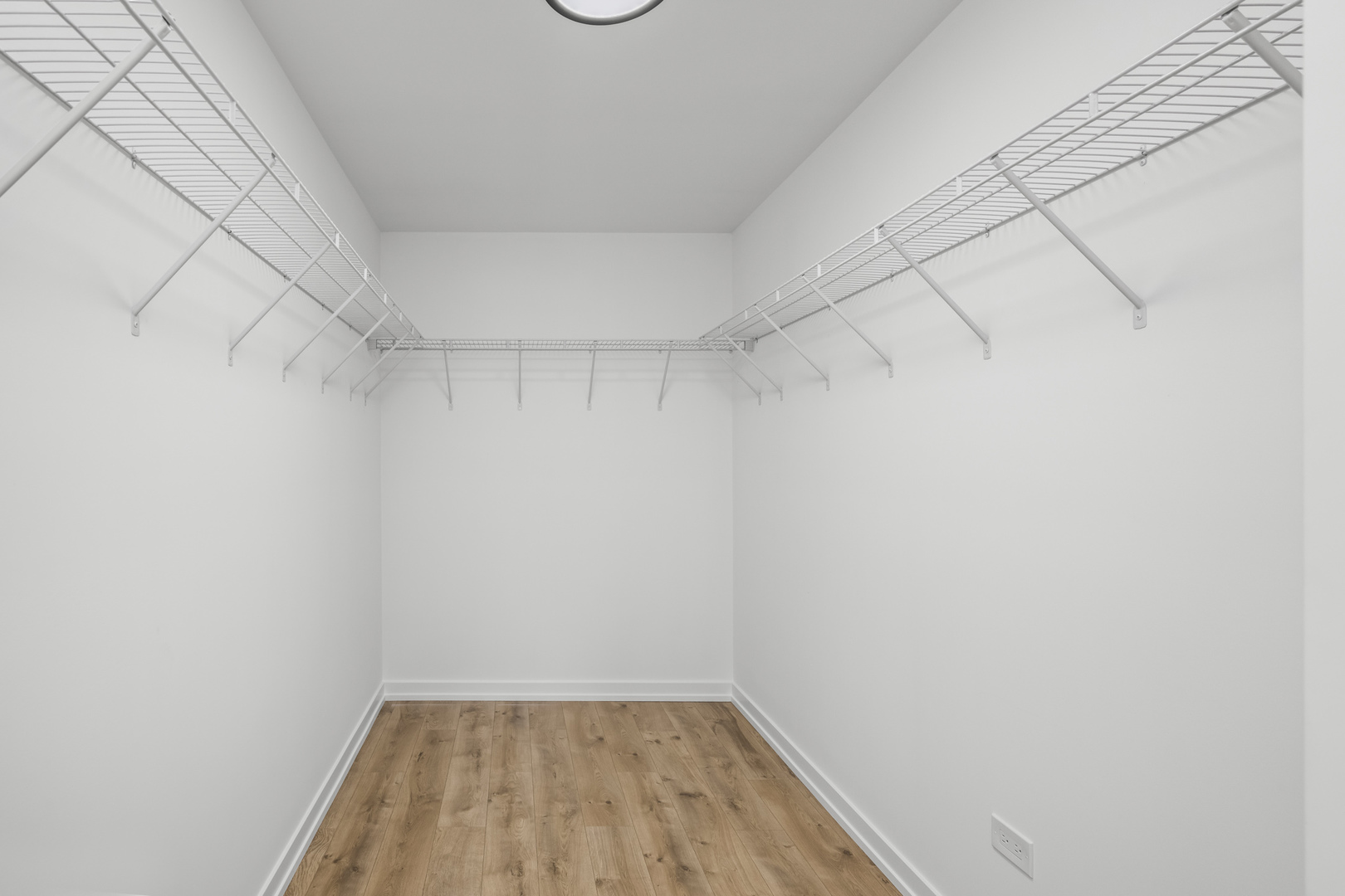 23612 North Field Road Lake Zurich, IL 60047 - Photo 13 of 16 a view of a room with racks on the wall