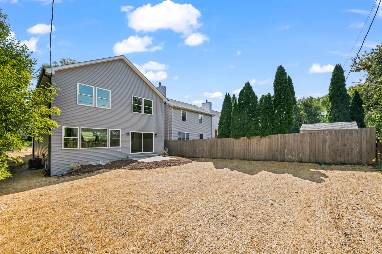 23612 North Field Road Lake Zurich, IL 60047 - Photo 16 of 16 a view of a backyard with a tree