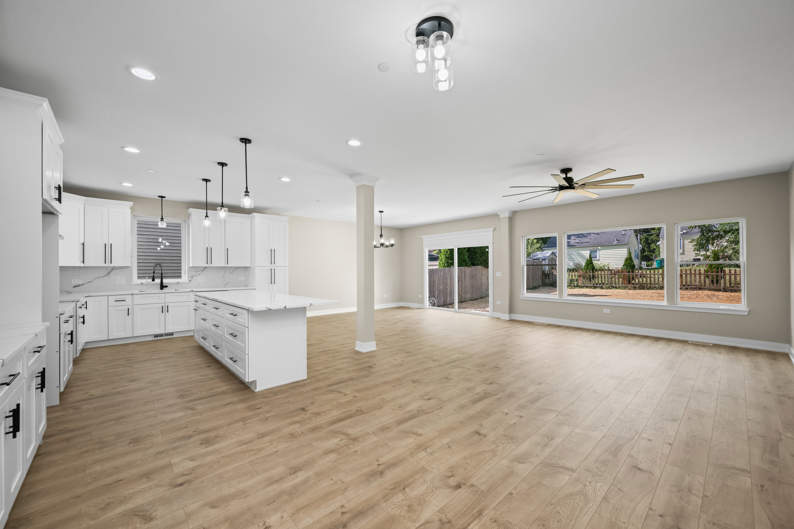 23612 North Field Road Lake Zurich, IL 60047 - Photo 3 of 16 a large white kitchen with a large window appliances and cabinets