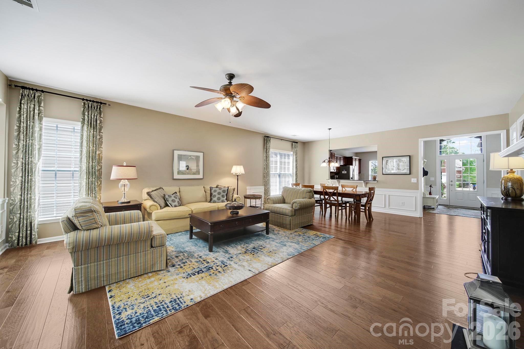 55414 Derringer Avenue Fort Mill, SC 29707 - Photo 13 of 45 a living room with furniture and wooden floor