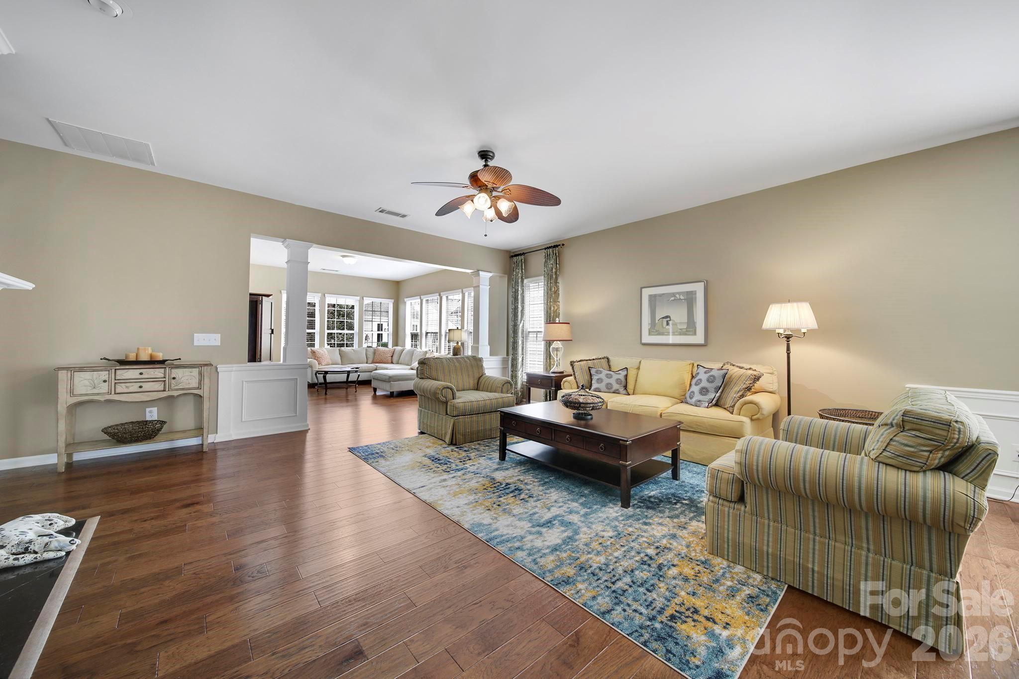 55414 Derringer Avenue Fort Mill, SC 29707 - Photo 14 of 45 a living room with furniture and a wooden floor