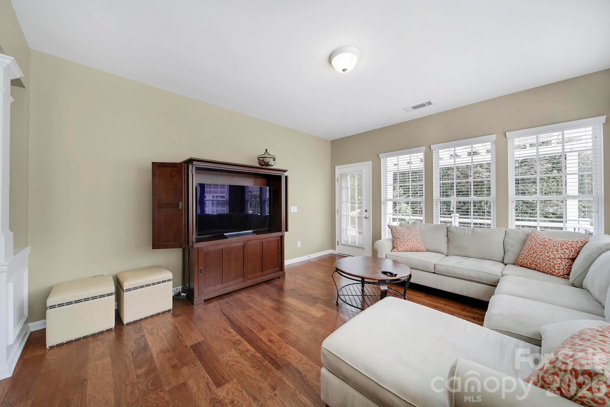 55414 Derringer Avenue Fort Mill, SC 29707 - Photo 16 of 45 a living room with furniture and a flat screen tv