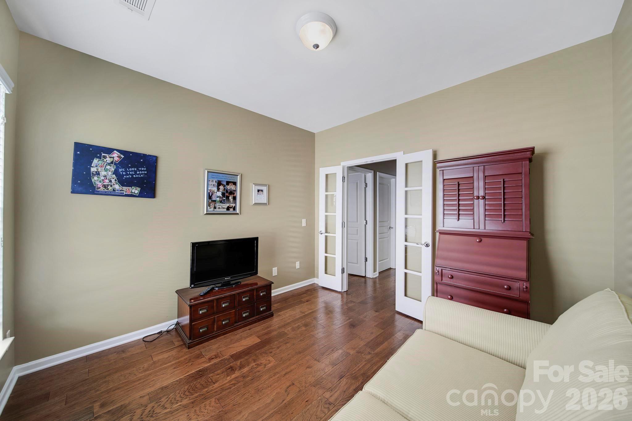 55414 Derringer Avenue Fort Mill, SC 29707 - Photo 27 of 45 a living room with furniture and a flat screen tv