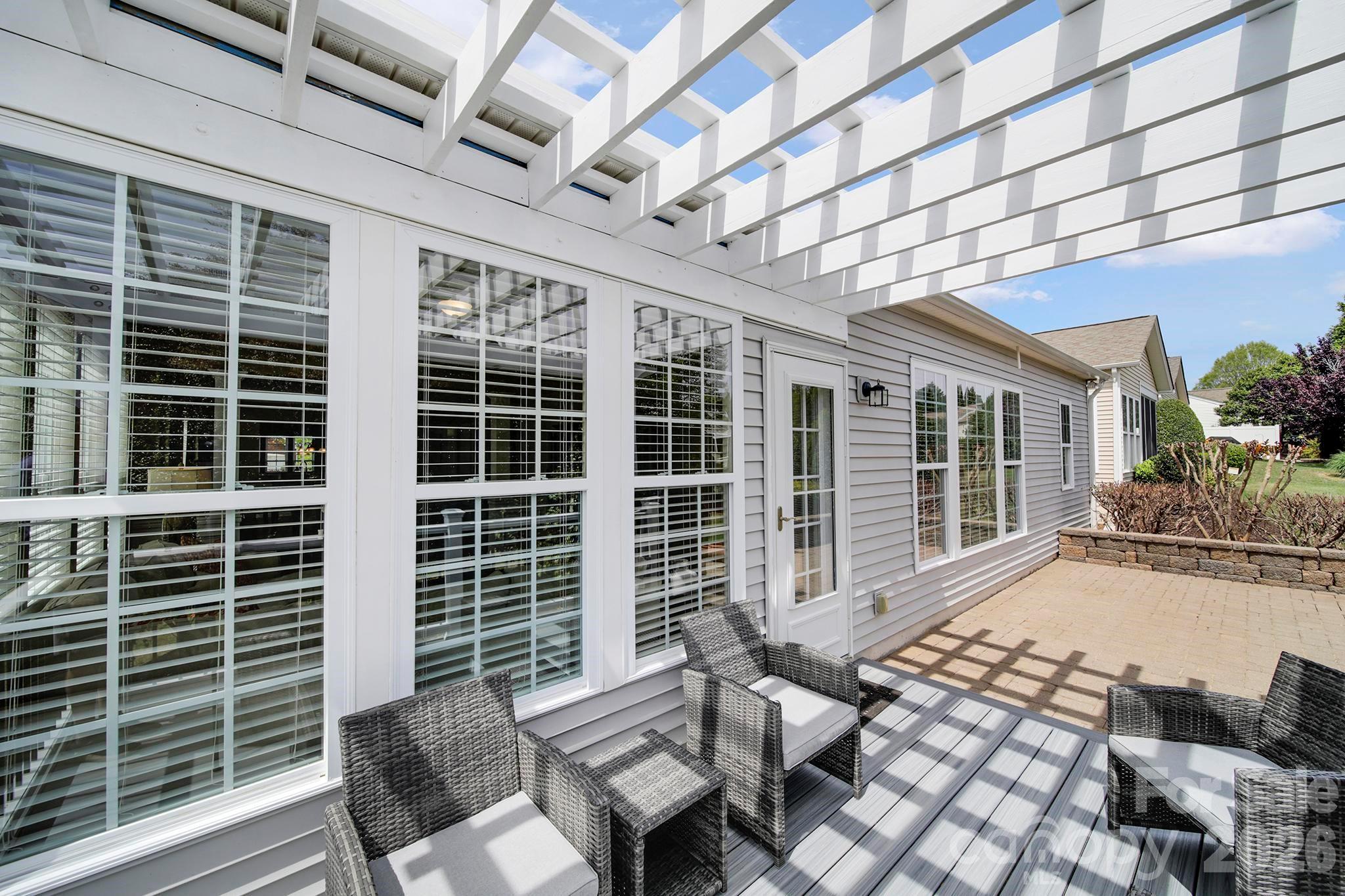 55414 Derringer Avenue Fort Mill, SC 29707 - Photo 29 of 45 a view of a porch with chairs