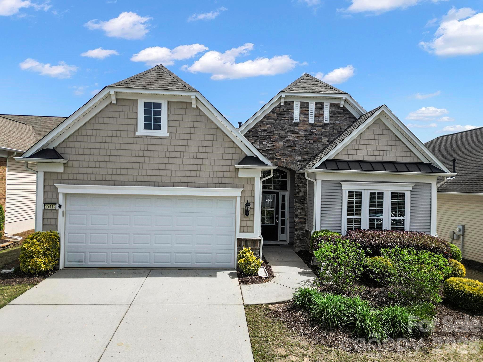 55414 Derringer Avenue Fort Mill, SC 29707 - Photo 37 of 45 a front view of a house with a yard