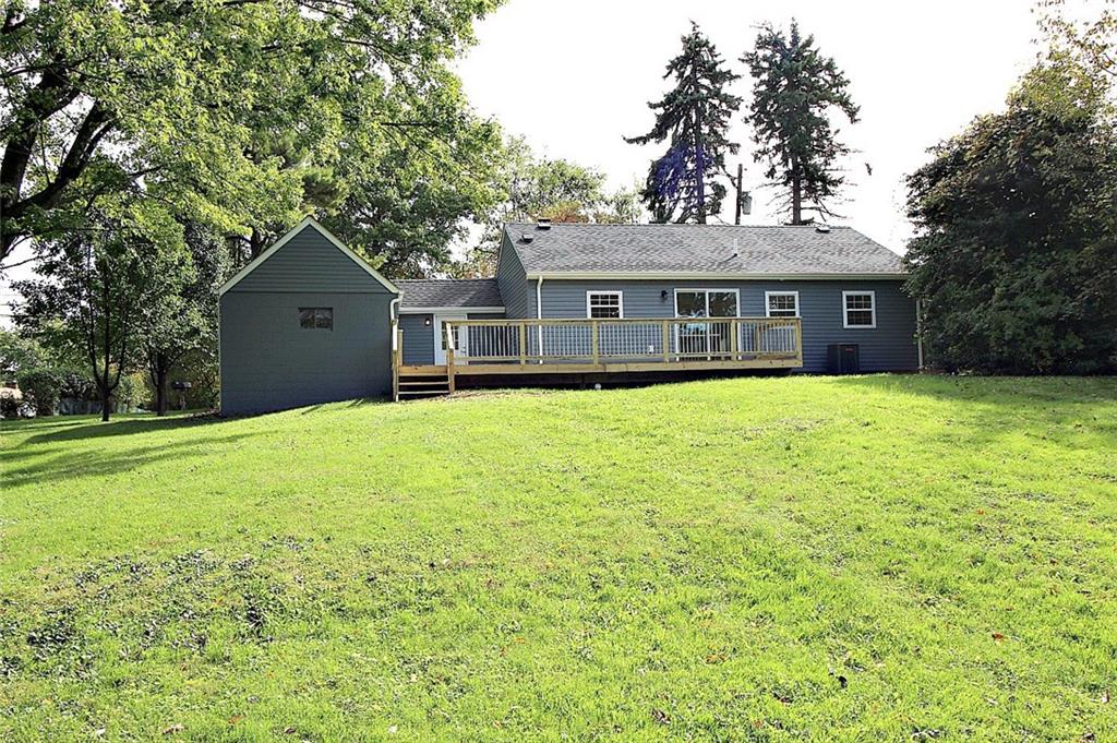 319 Ridge Road Sewickley, PA 15143 - Photo 22 of 25 Rear image of home on a semi-level back yard. 1/2 acre lot