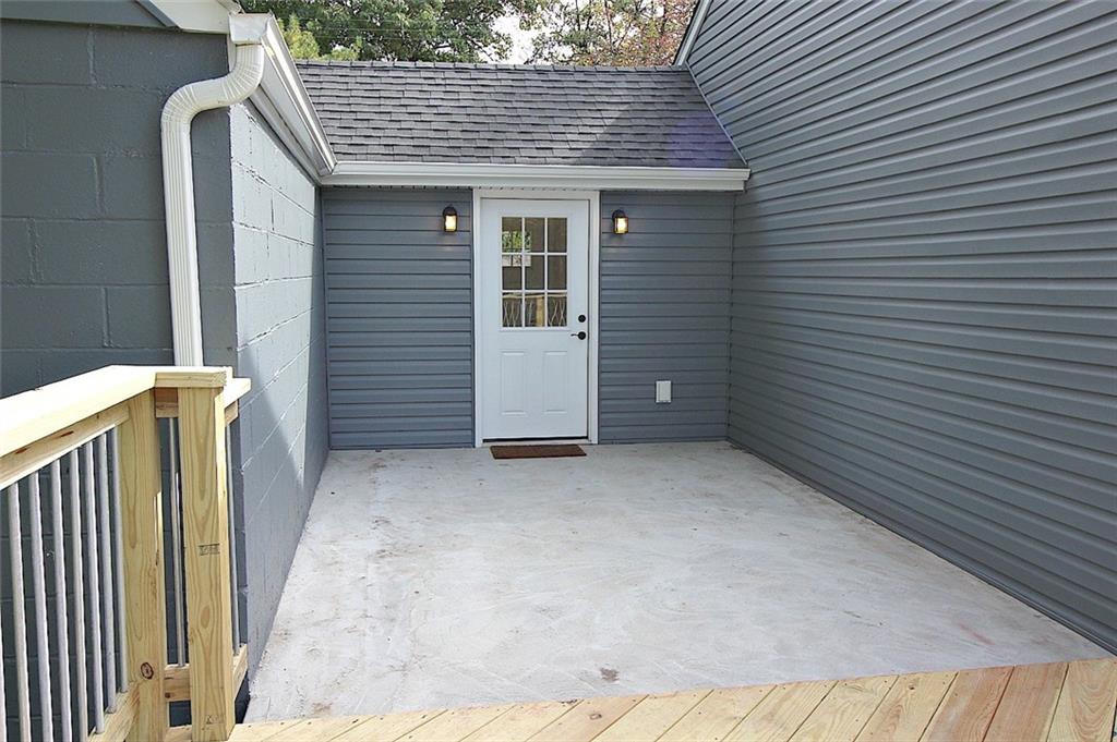 319 Ridge Road Sewickley, PA 15143 - Photo 24 of 25 Private patio. Perfect for a hot tub! Enter into enclosed breezeway with heated flooring