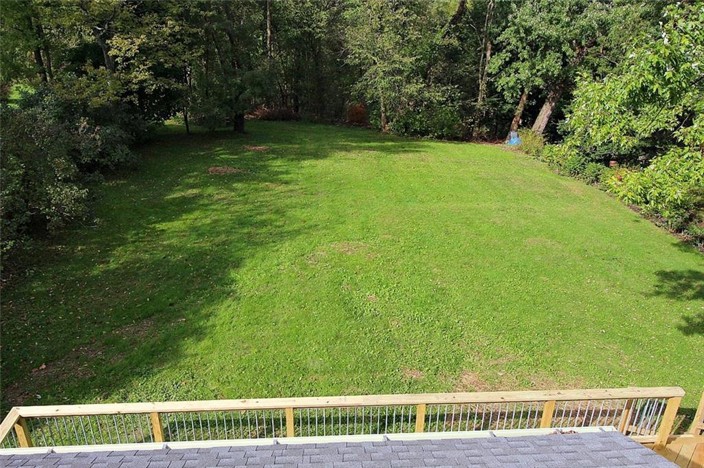 319 Ridge Road Sewickley, PA 15143 - Photo 25 of 25 Semi level view of back yard. Walking trail to Ohio township park through wooded area
