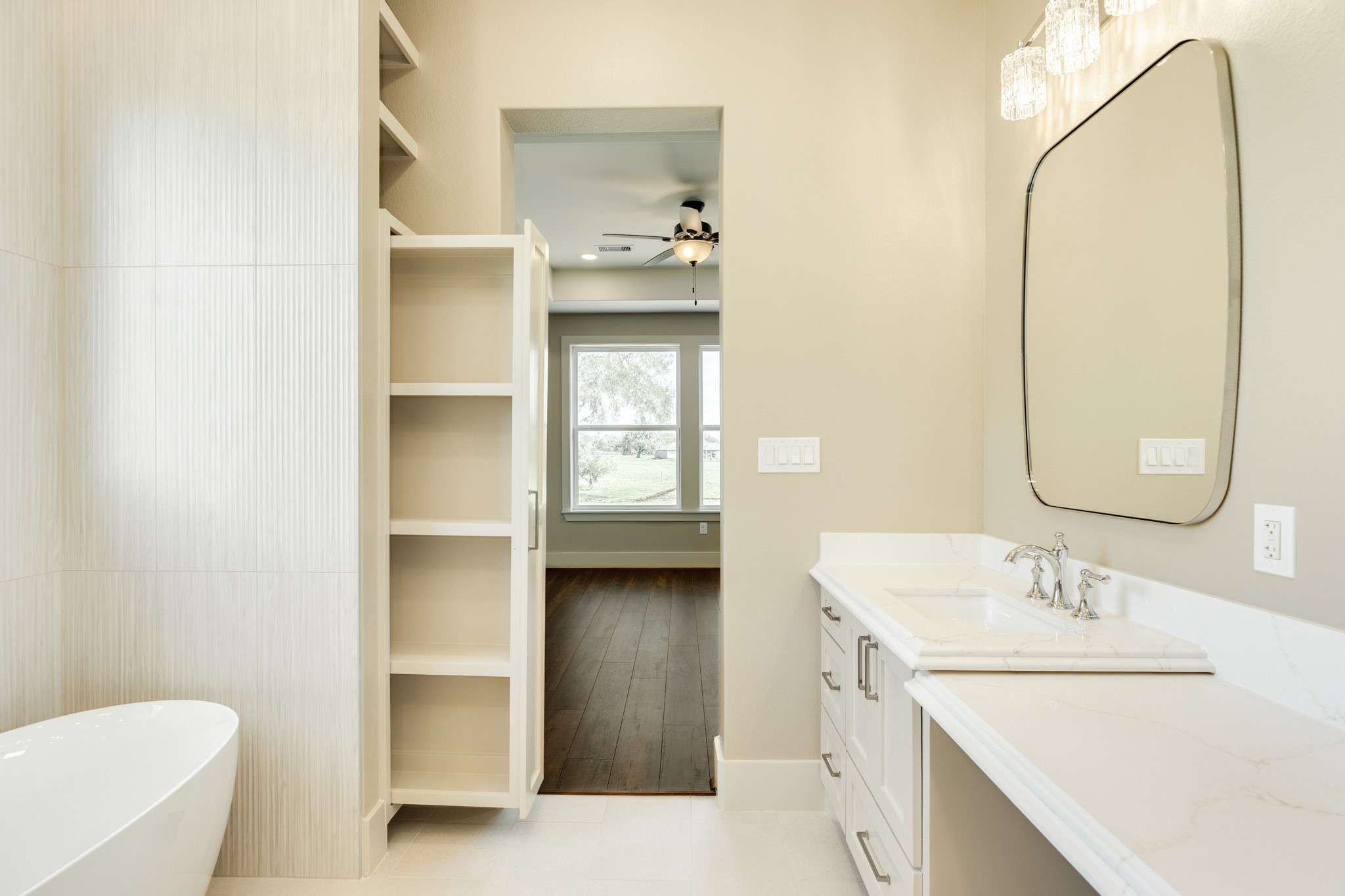 1737 Flintlock Court Angleton, TX 77515 - Photo 29 of 47 Tons of storage in this well thought out bathroom.