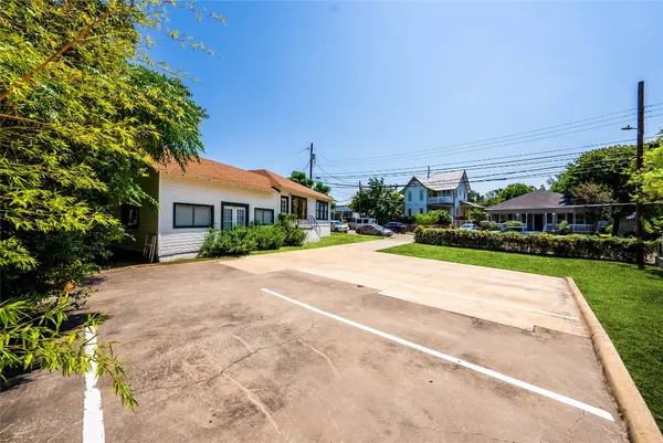 a house with yard in front of it