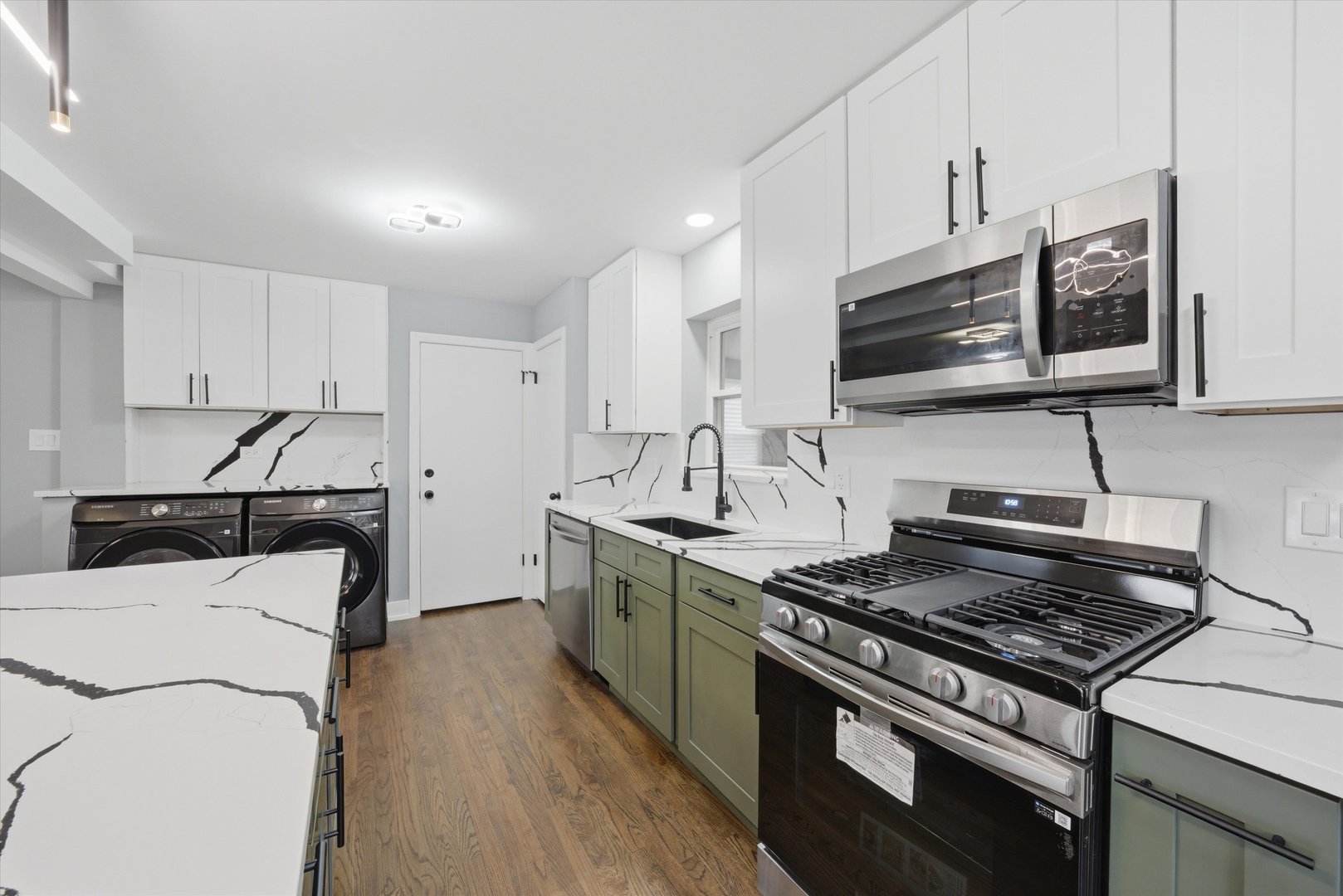 3743 West 83rd Street Chicago, IL 60652 - Photo 11 of 51 a kitchen with a stove and a microwave