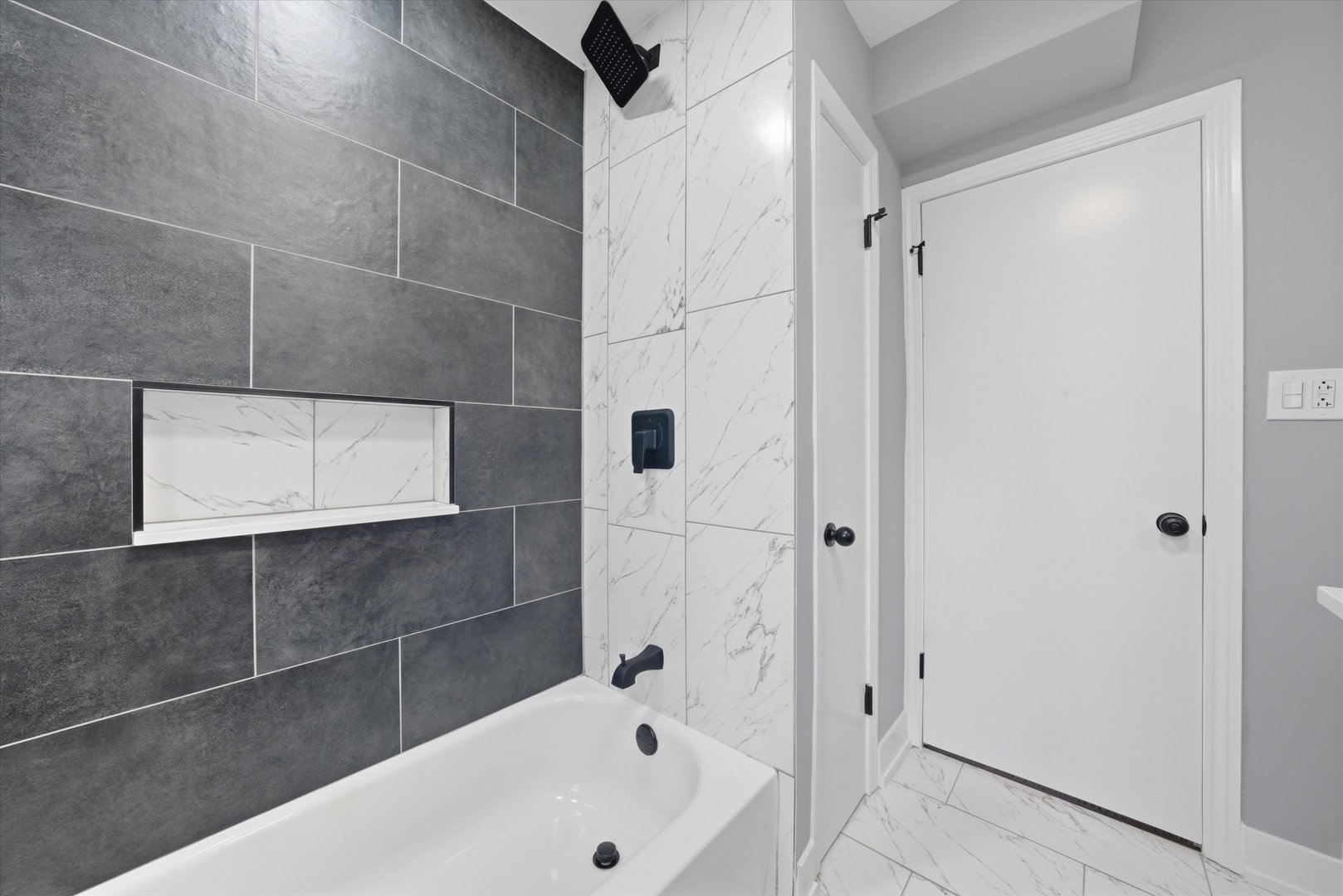 3743 West 83rd Street Chicago, IL 60652 - Photo 19 of 51 a bathroom with a bathtub and a shower