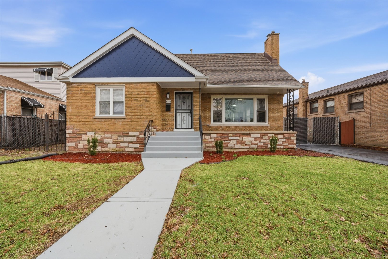 3743 West 83rd Street Chicago, IL 60652 - Photo 2 of 51 a front view of a house with a yard