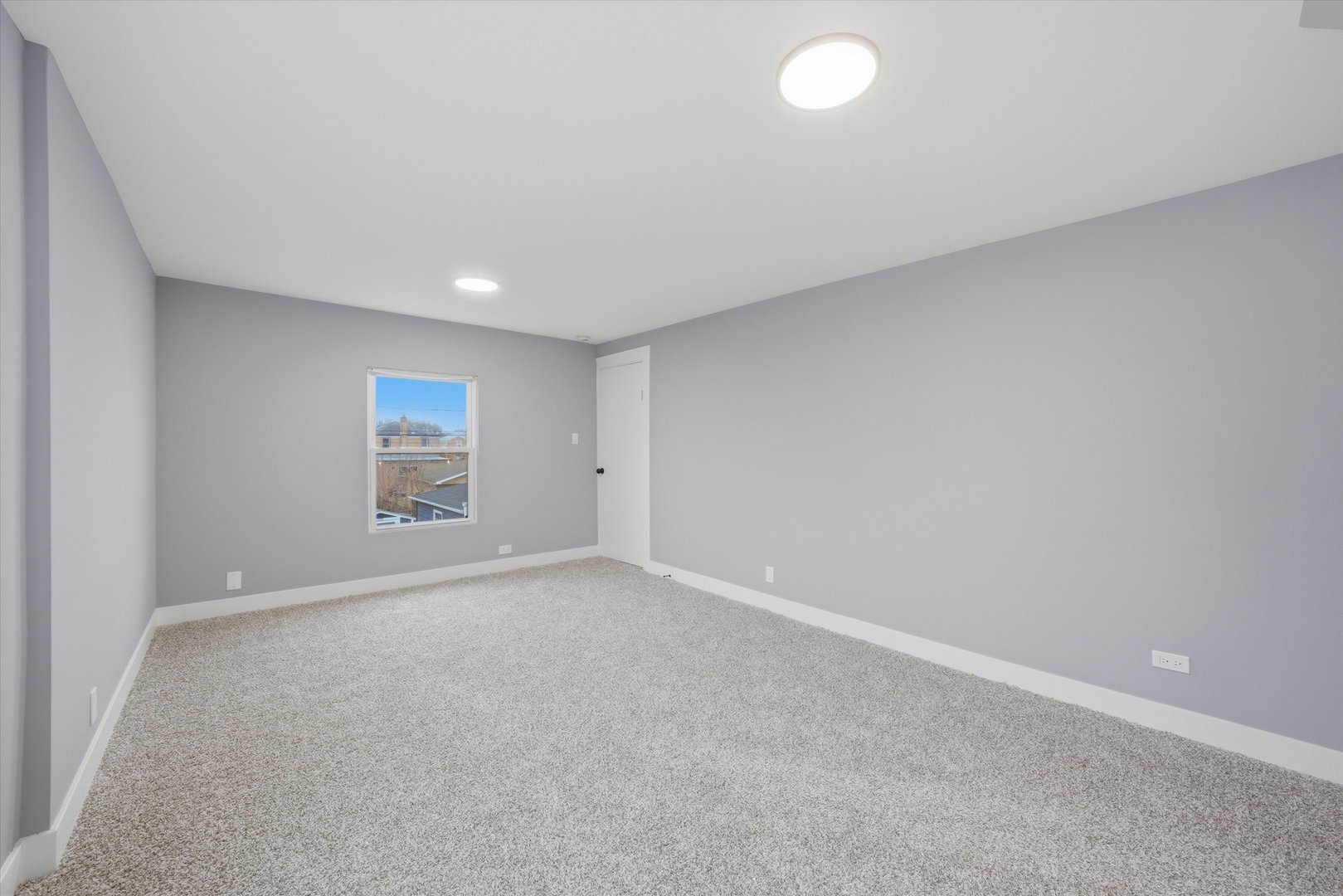 3743 West 83rd Street Chicago, IL 60652 - Photo 27 of 51 an empty room with a empty space and window