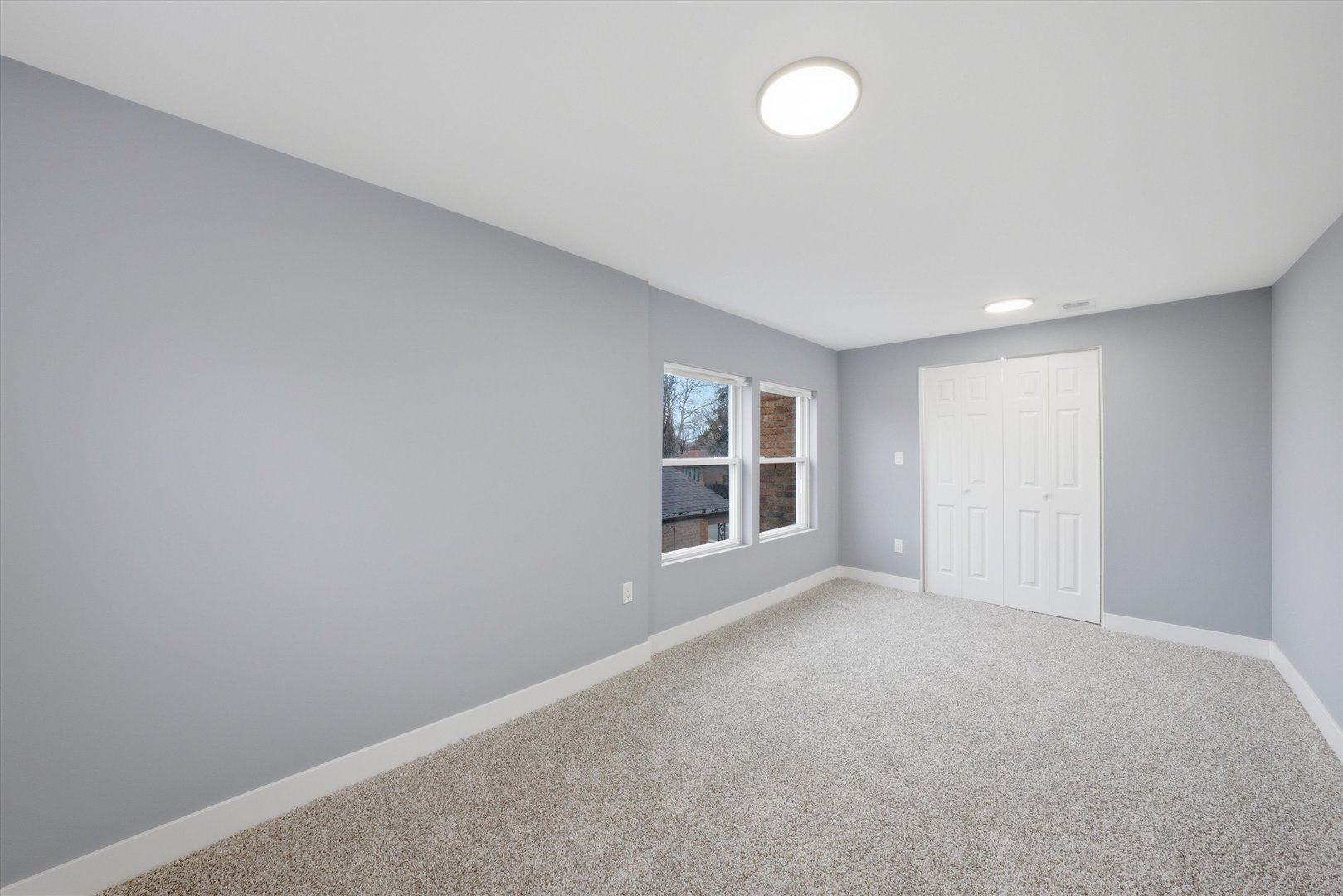 3743 West 83rd Street Chicago, IL 60652 - Photo 28 of 51 an empty room with windows
