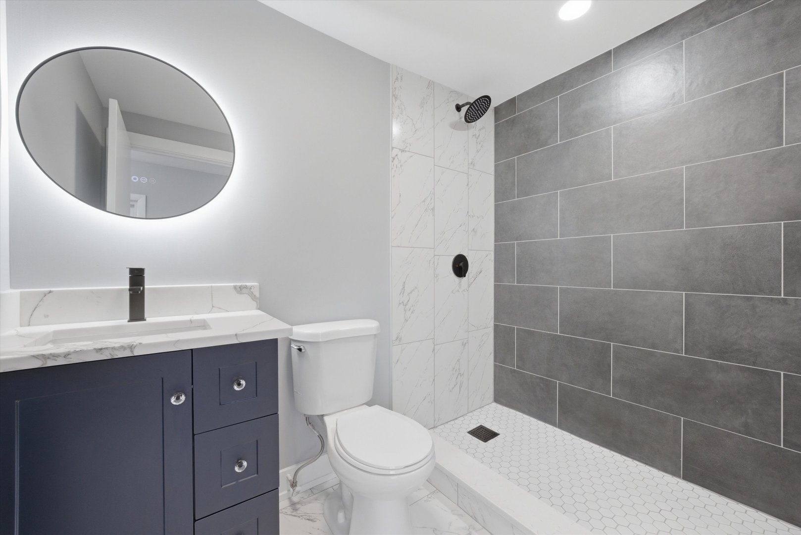 3743 West 83rd Street Chicago, IL 60652 - Photo 33 of 51 a bathroom with a sink a toilet and a mirror