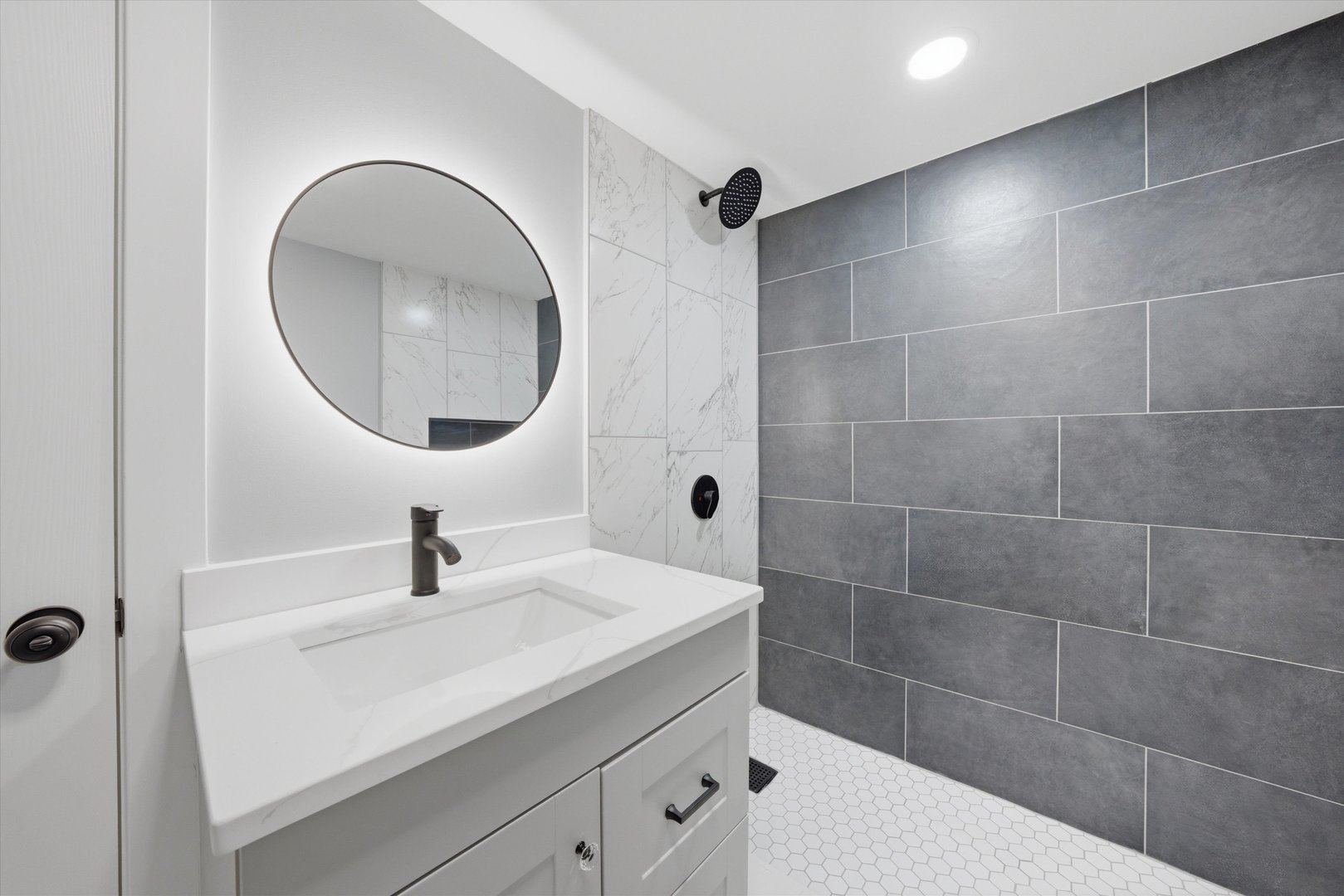 3743 West 83rd Street Chicago, IL 60652 - Photo 39 of 51 a bathroom with a sink and a mirror
