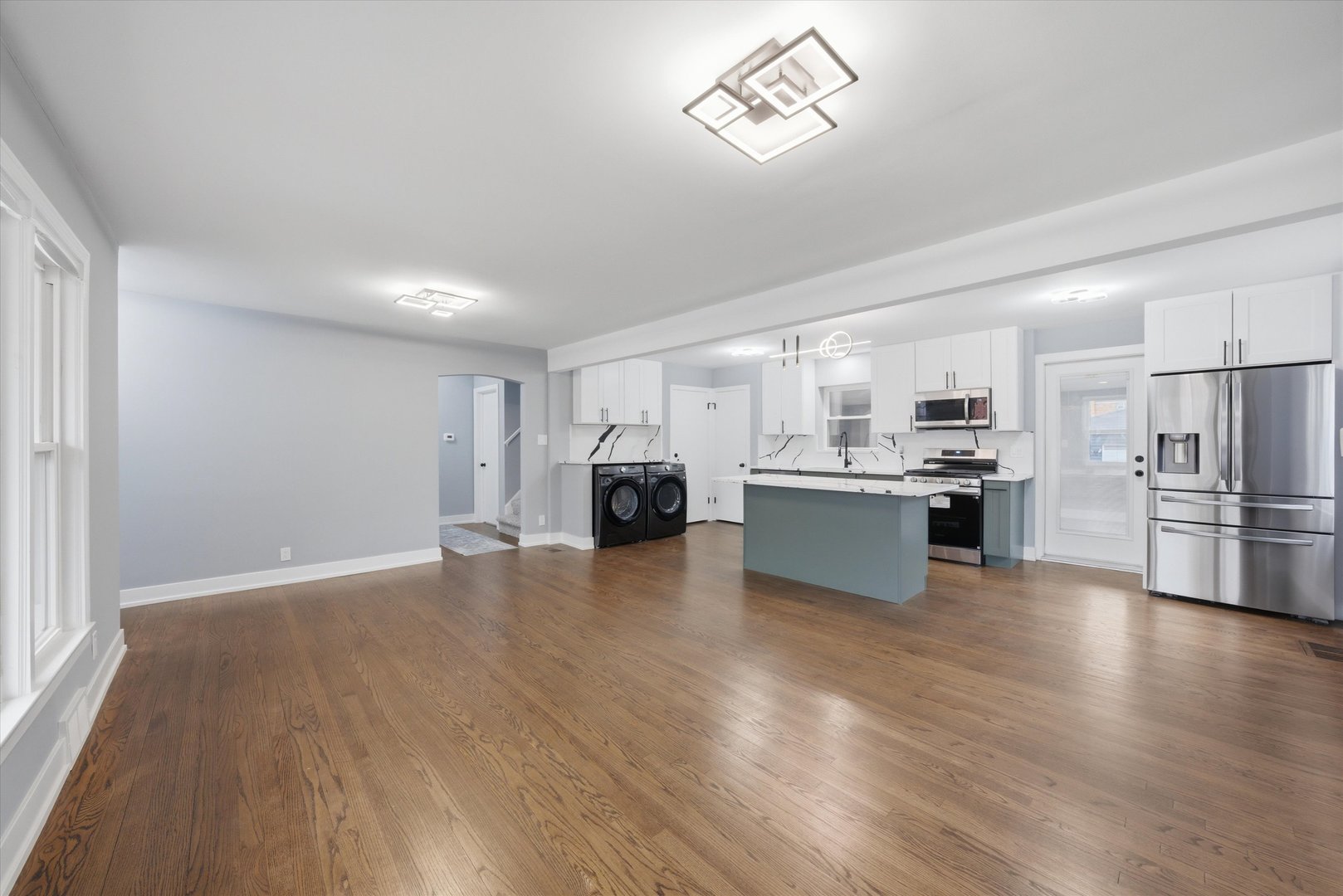 3743 West 83rd Street Chicago, IL 60652 - Photo 9 of 51 a view of kitchen with cabinets stainless steel appliances and wooden floor