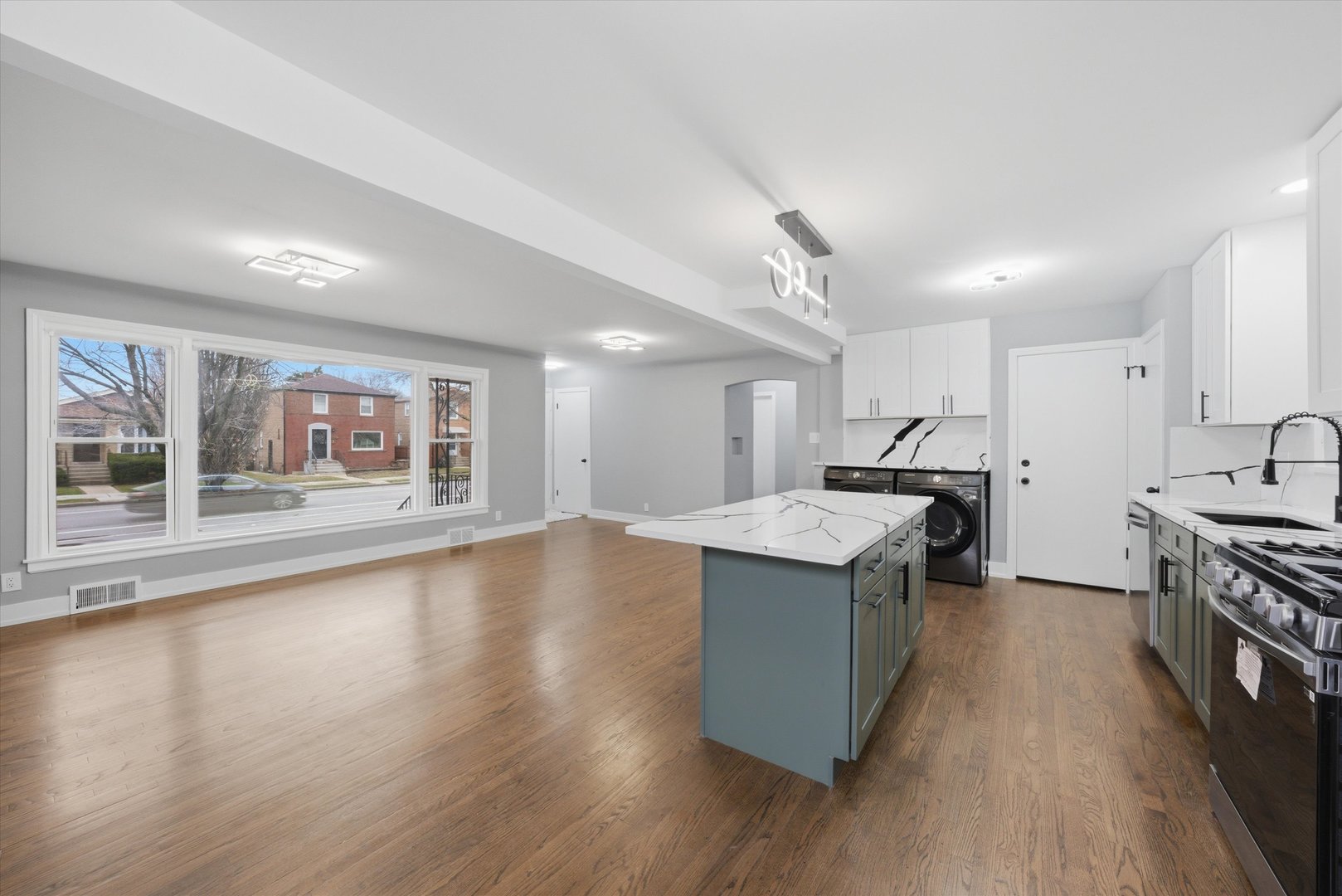 3743 West 83rd Street Chicago, IL 60652 - Photo 10 of 51 a kitchen with stainless steel appliances granite countertop a stove and a refrigerator