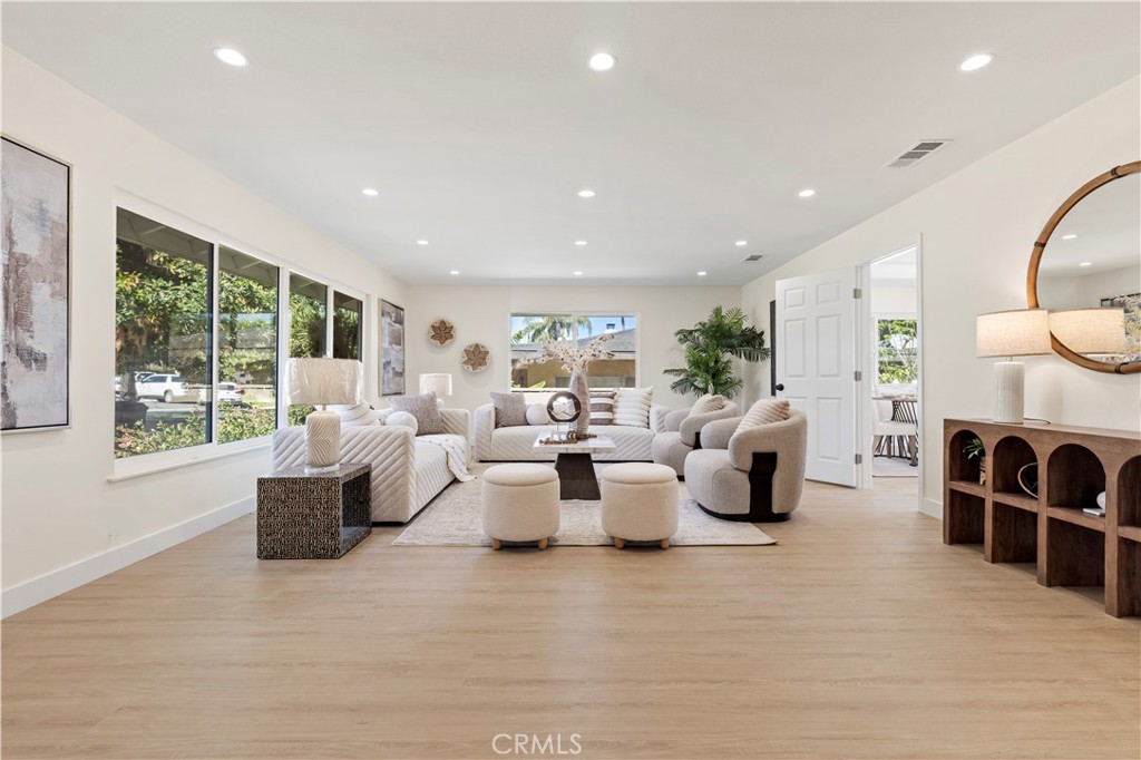645 Lancer Lane Corona, CA 92879 - Photo 11 of 69 a living room with fireplace furniture and a large window