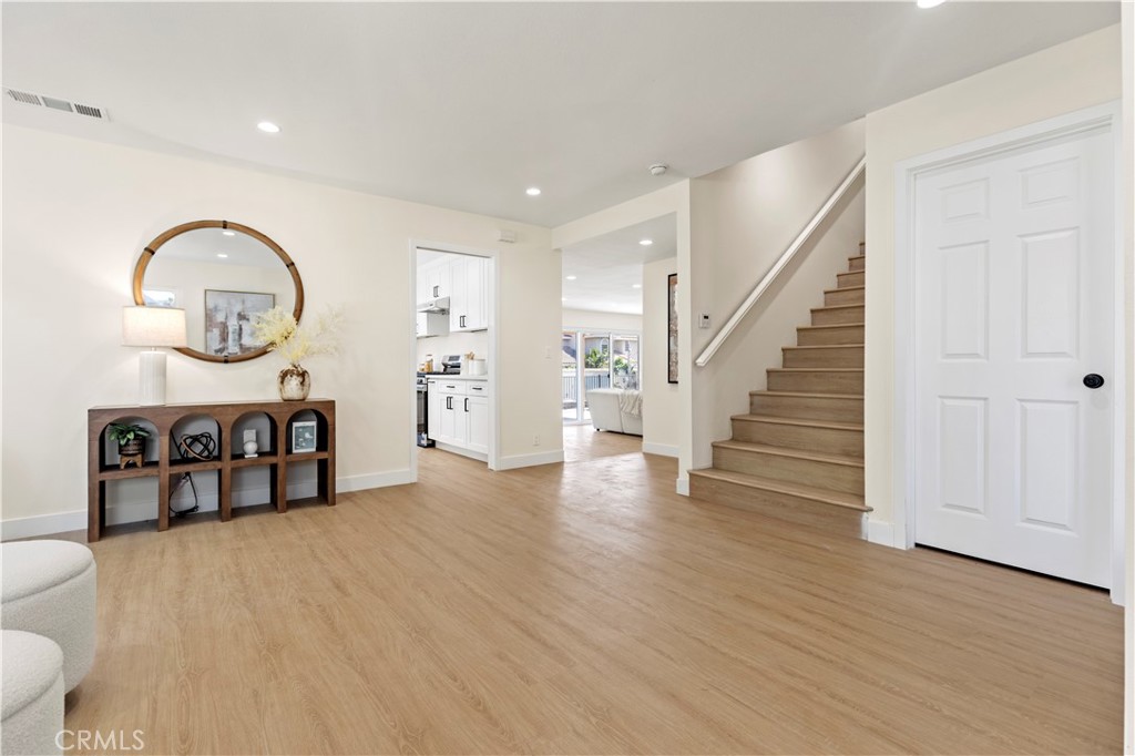 645 Lancer Lane Corona, CA 92879 - Photo 19 of 69 a view of a livingroom with furniture and wooden floor