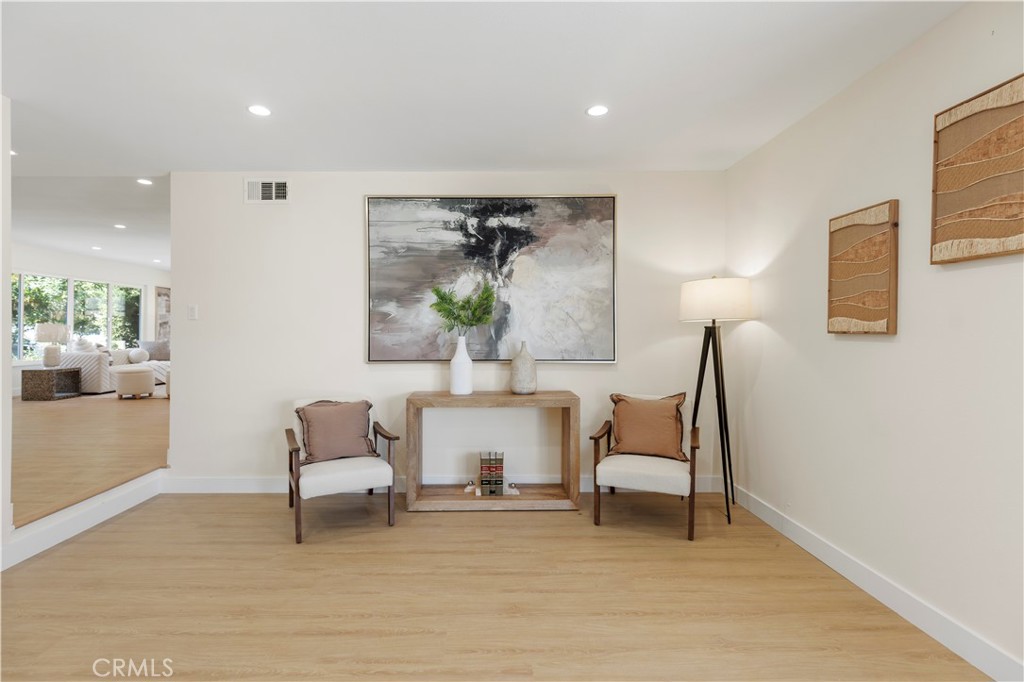 645 Lancer Lane Corona, CA 92879 - Photo 21 of 69 a living room with furniture and a lamp