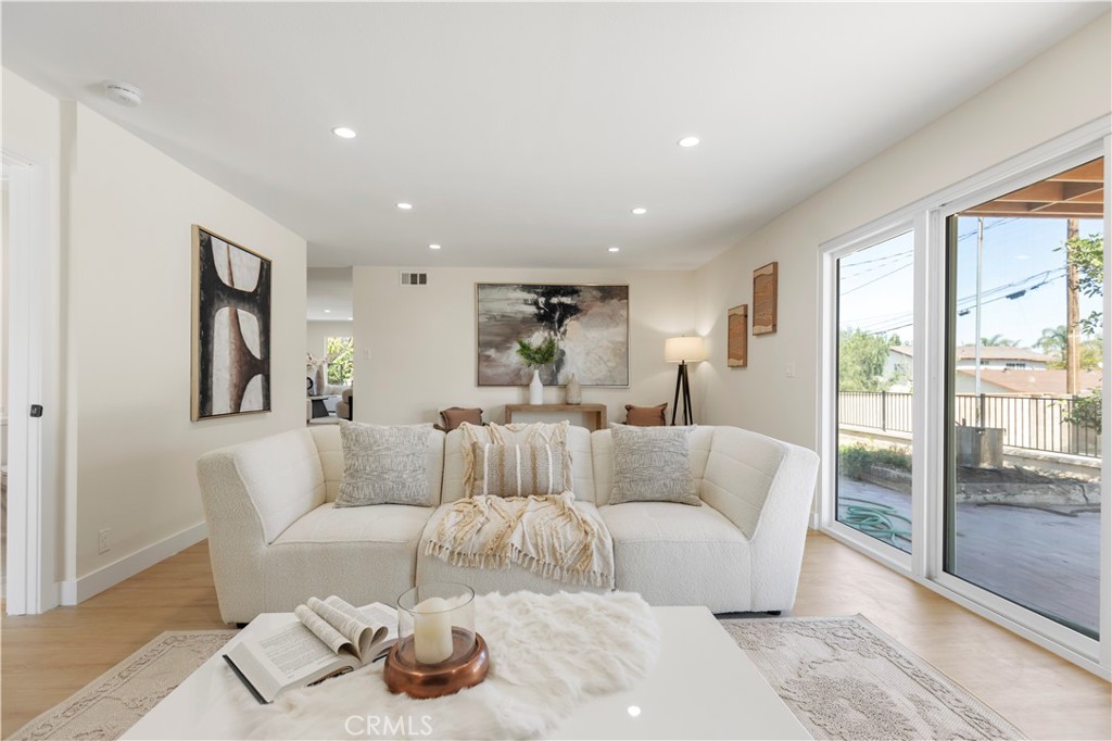 645 Lancer Lane Corona, CA 92879 - Photo 22 of 69 a living room with furniture and a large window