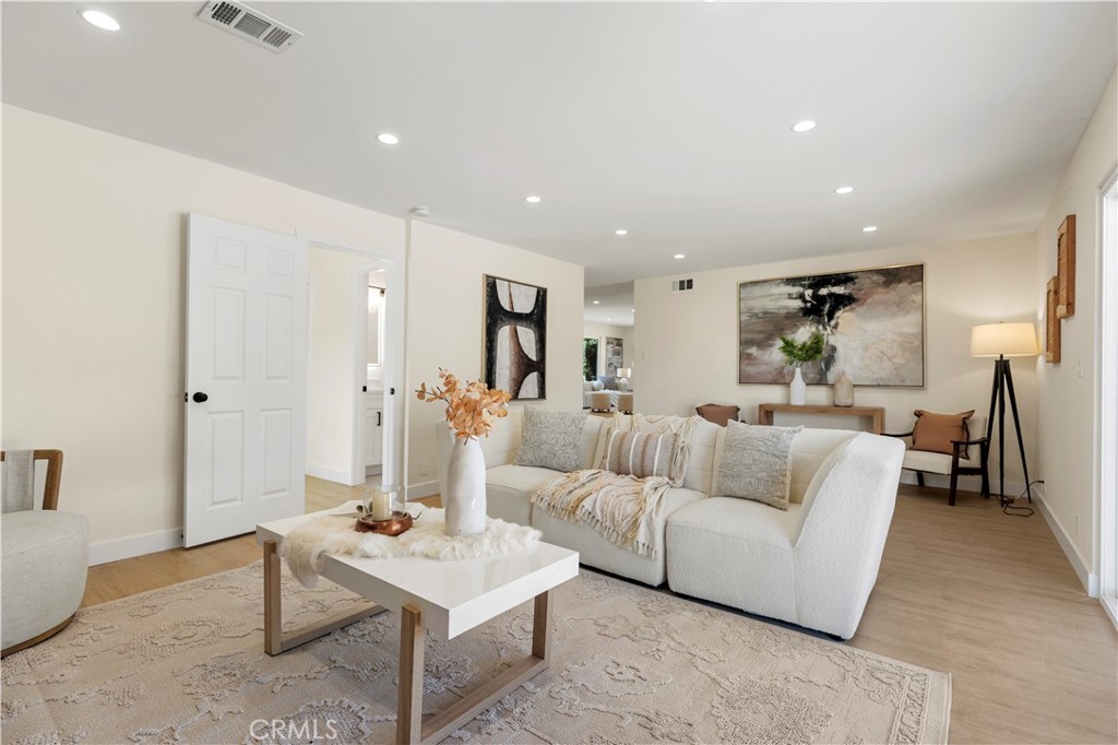 645 Lancer Lane Corona, CA 92879 - Photo 23 of 69 a living room with furniture and a table