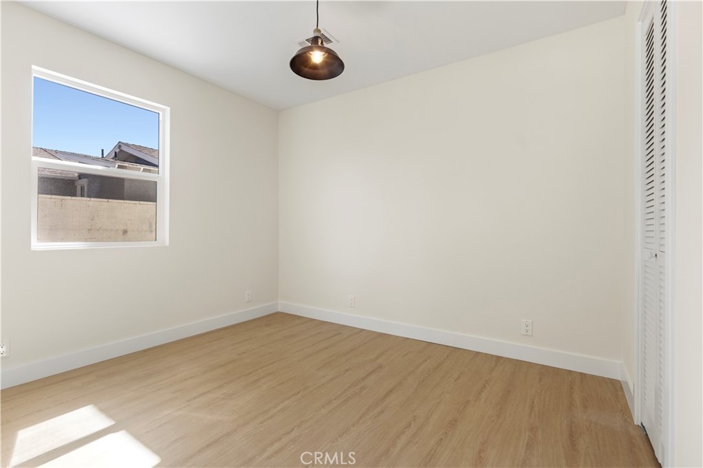 645 Lancer Lane Corona, CA 92879 - Photo 25 of 69 an empty room with a window