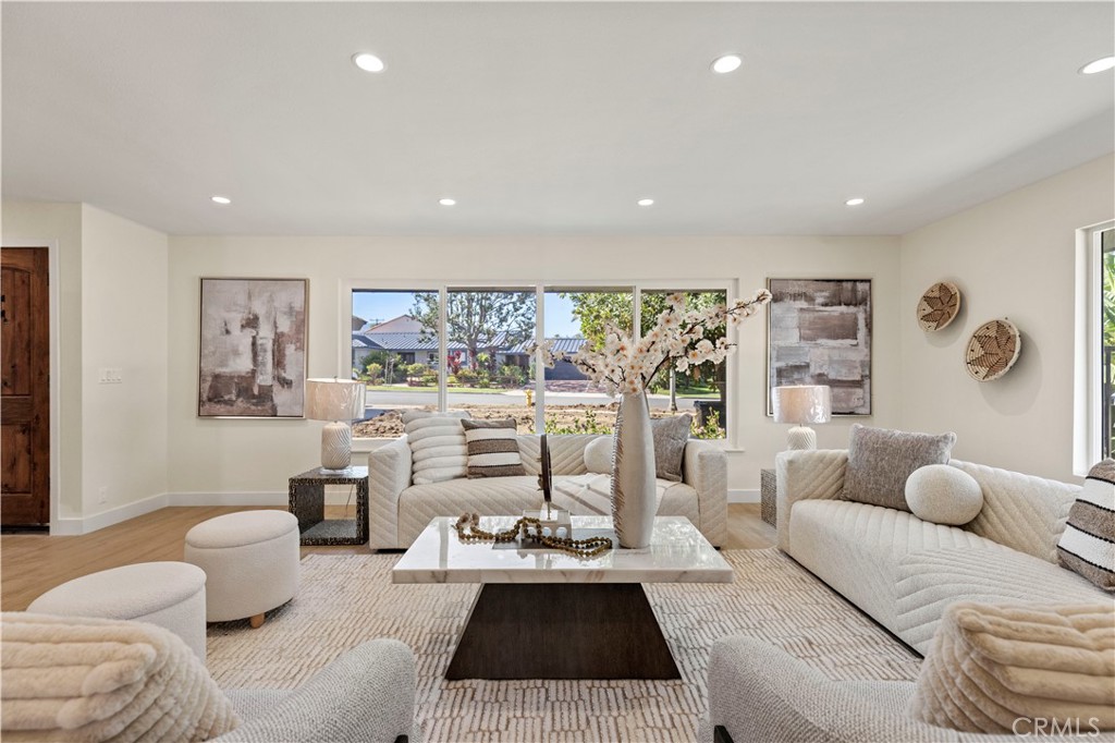 645 Lancer Lane Corona, CA 92879 - Photo 4 of 69 a living room with furniture and a large window