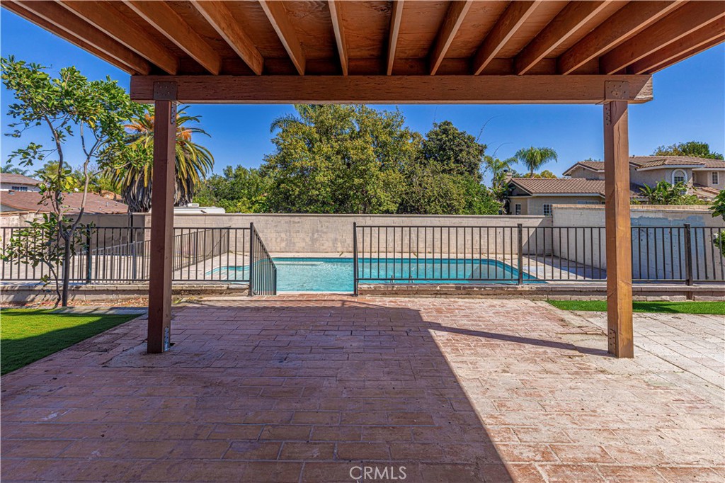 645 Lancer Lane Corona, CA 92879 - Photo 42 of 69 a view of a backyard with porch