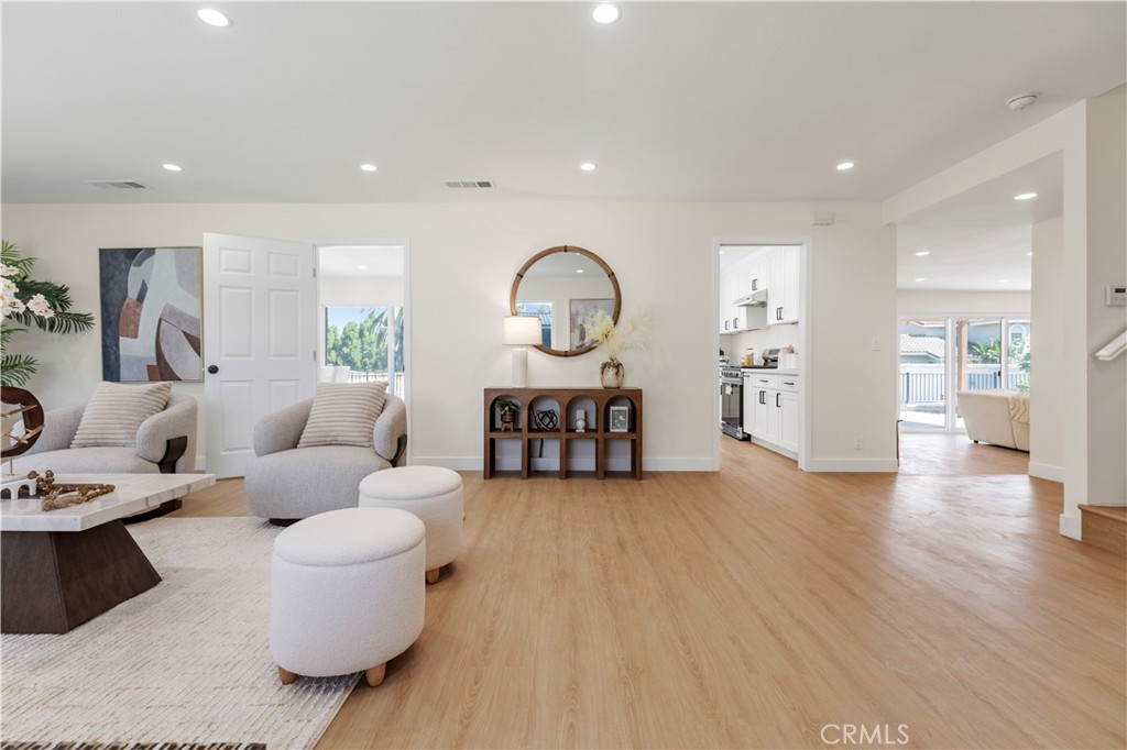 645 Lancer Lane Corona, CA 92879 - Photo 10 of 69 a living room with furniture and a wooden floor
