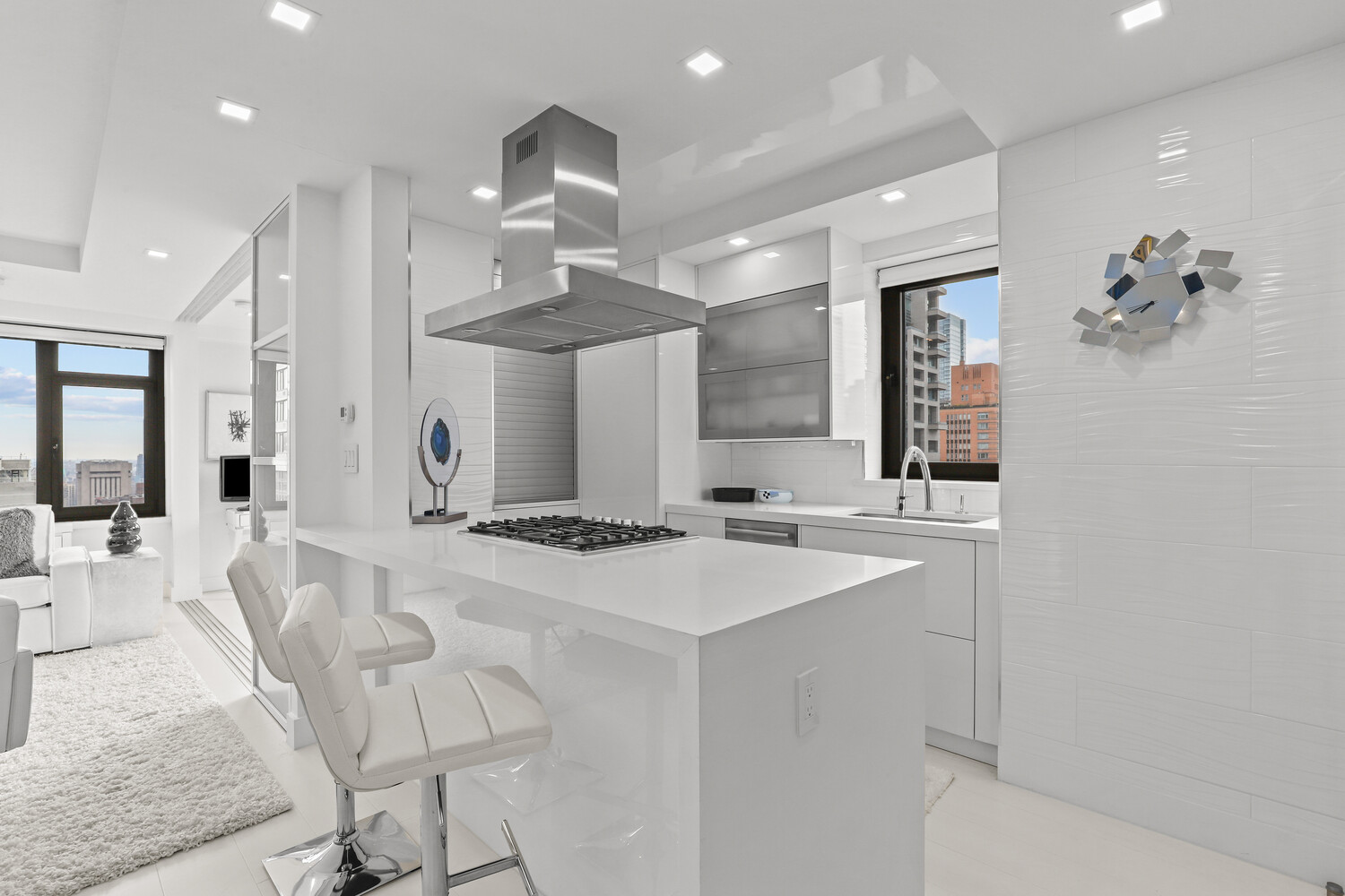 160 East 65th Street, Unit 26B Manhattan, NY 10065 - Photo 5 of 12 a large kitchen with a sink and a large window