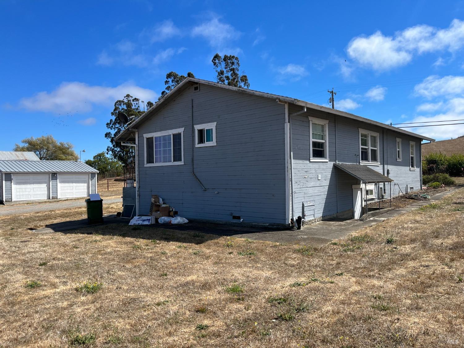 530 Tomales Road Petaluma, CA 94952 - Photo 25 of 32 a view of a house with a yard