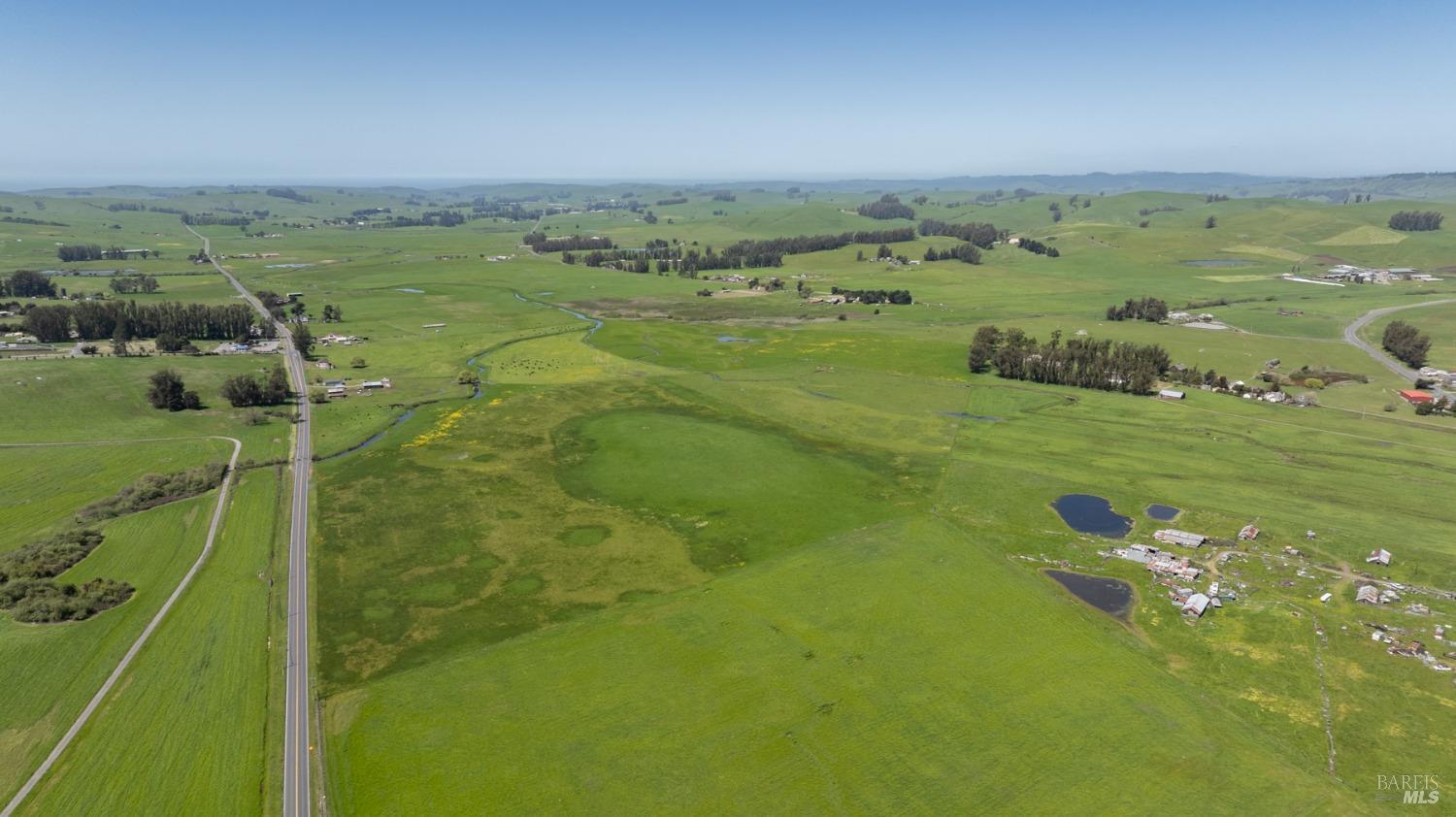 530 Tomales Road Petaluma, CA 94952 - Photo 4 of 32 a view of a lake from a yard
