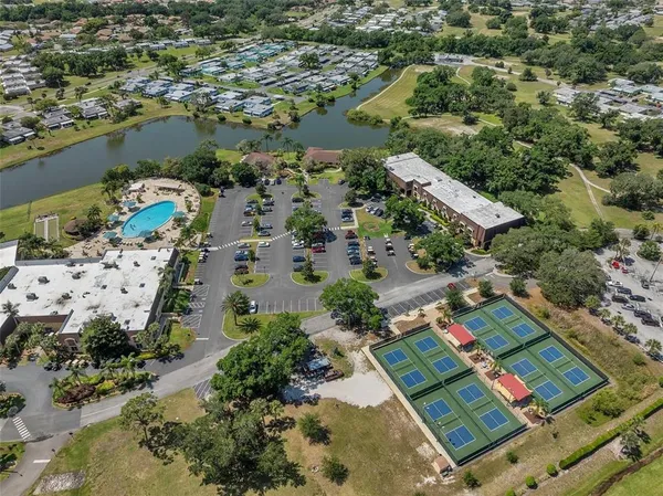 an aerial view of a house with a outdoor space