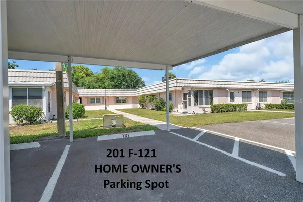 a view of house with yard