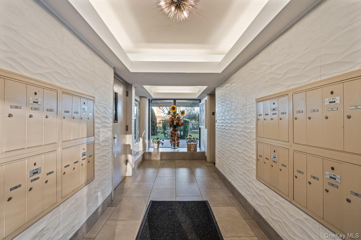 168-11 12th Avenue, Unit 3D Queens, NY 11357 - Photo 19 of 21 a hallway with white cabinets