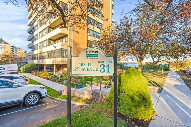a view of swimming pool with a patio and a yard