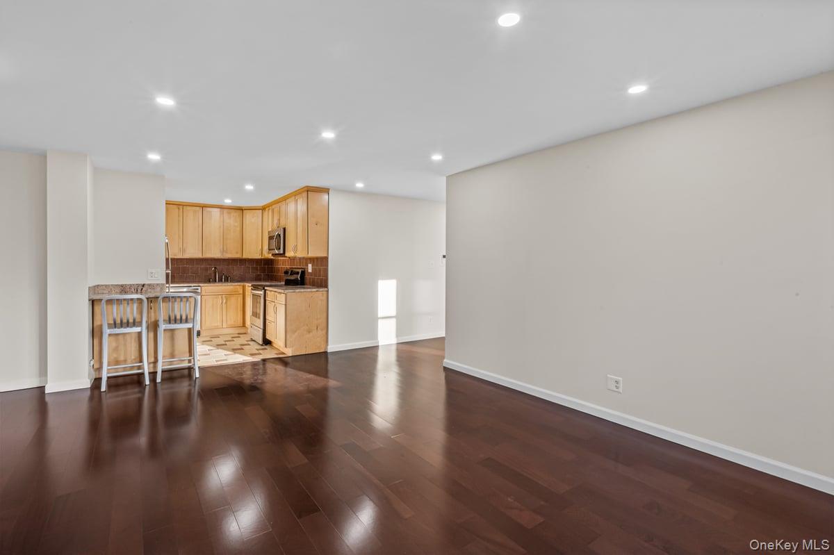 168-11 12th Avenue, Unit 3D Queens, NY 11357 - Photo 7 of 21 a view of kitchen with wooden floor