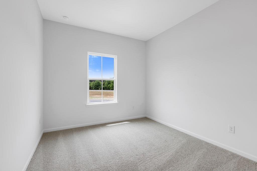 172 Sweet Water Lane Southeast Rome, GA 30161 - Photo 22 of 29 a view of an empty room with a window