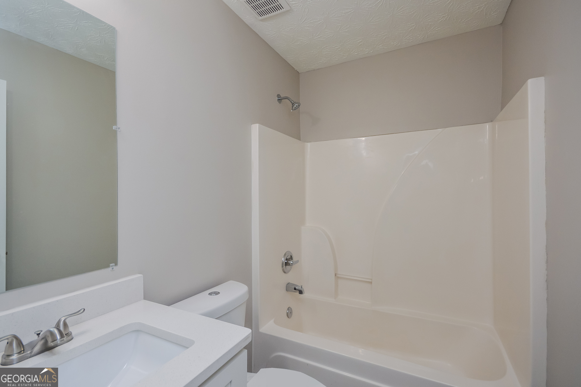 110 Tara Way Covington, GA 30016 - Photo 16 of 17 a bathroom with a bathtub and a sink