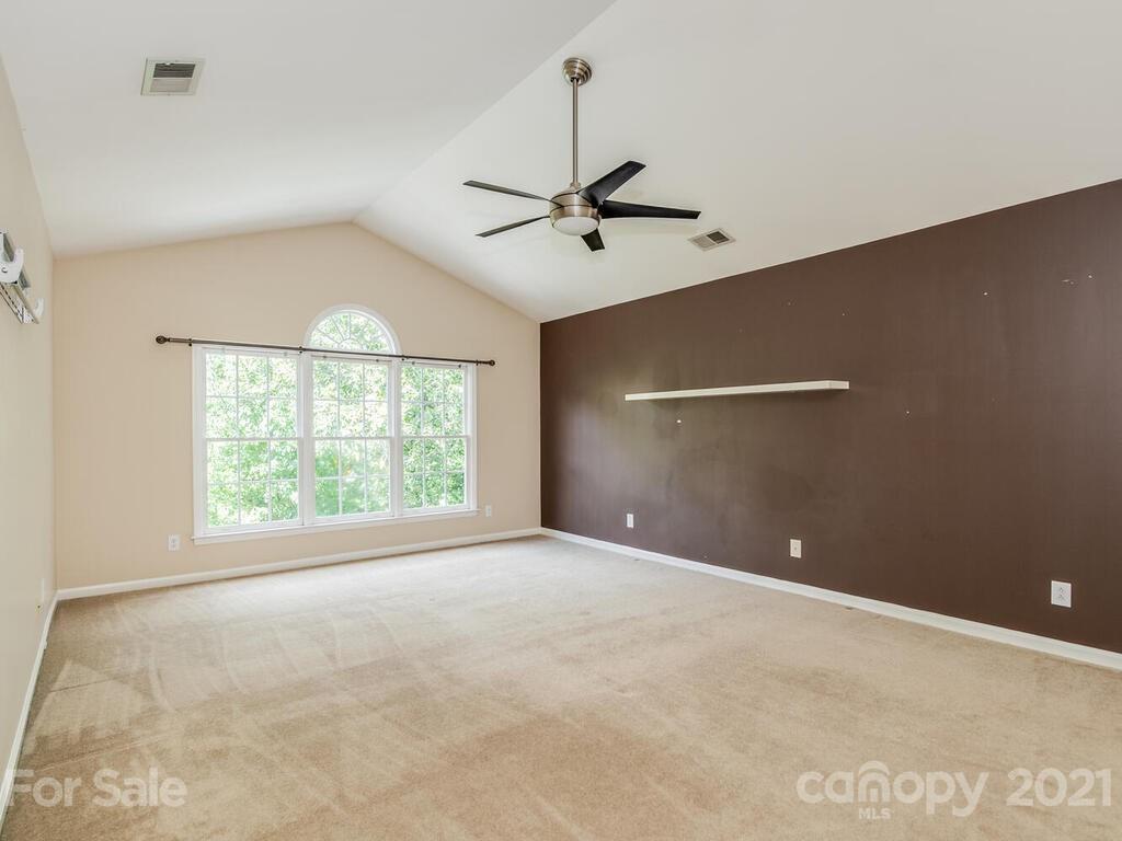 5530 Piper Glen Drive Charlotte, NC 28277 - Photo 20 of 35 a view of an empty room with a window